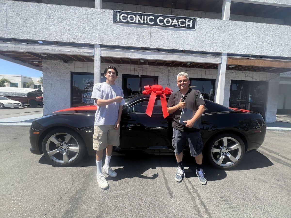 A customer picking up their car