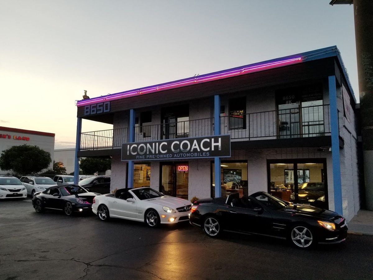 The Iconic Coach showroom on Miramar Road in the evening